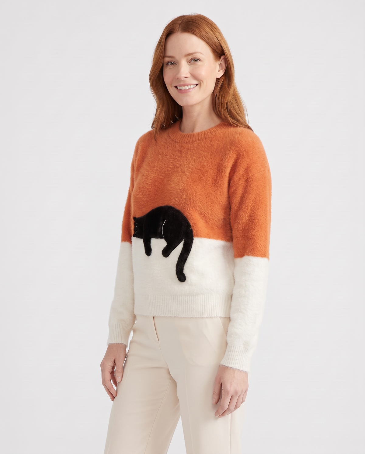 Millie Women's Knitted Jumper in Orange, three quarter view