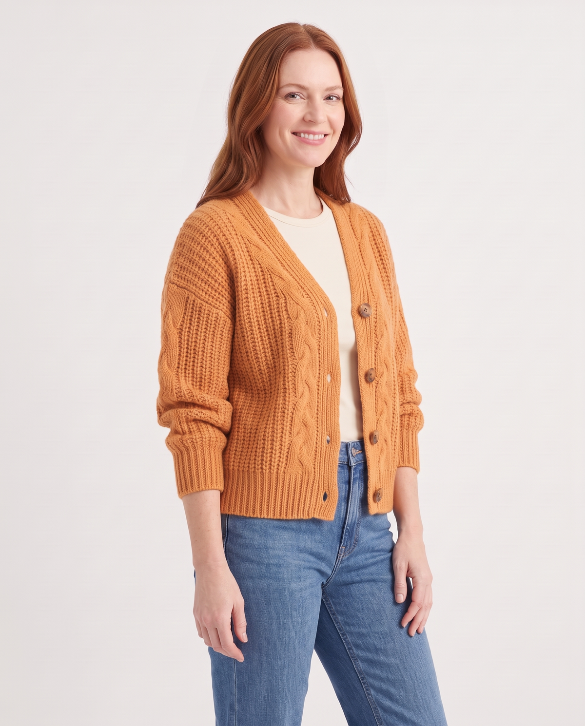 Cecily Women's Cropped Chunky Knit Cardigan in Apricot, three quarter view